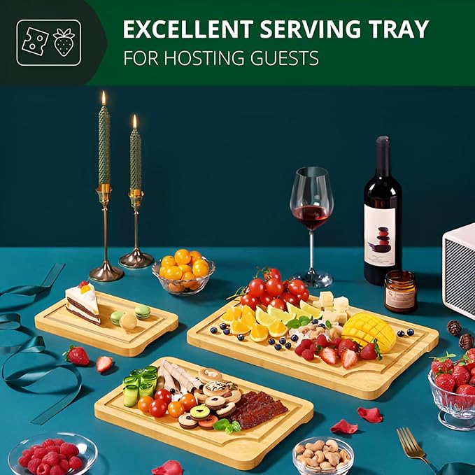 Bamboo cutting board set used as charcuterie platter with cheese, fruits and meats for holiday entertaining
